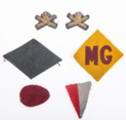 WWI British Machine Gun Corps insignia, pair bullion wire collar badges, cloth MG on yellow felt,