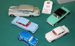 5 Dinky Toys. Humber Hawk in green and black. Volkswagen 1500 in cream. Mini Minor automatic in