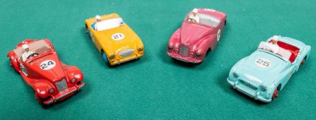 4 Dinky Toys competition cars. Triumph TR3 in turquoise with red interior and wheels, RN25.