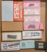12 white metal model kits. mainly buses, also includes 2 x Langley Miniatures taxi kits and a