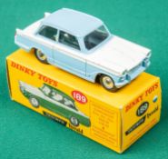 Dinky Toys Triumph Herald (189). An example in light blue and white. Boxed. Vehicle VGC. A few small