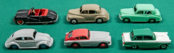 6 Dinky Toys. Triumph Herald in dark green and white. Hillman Minx in light green with dark green