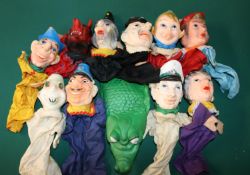 A collection of 11 1960's/70's children's hand puppets. Squidgy rubber cartoon style faces with