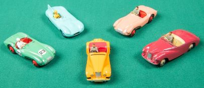 5 Dinky Toys sports cars. Jaguar D Type in turquoise, late issue example with yellow plastic
