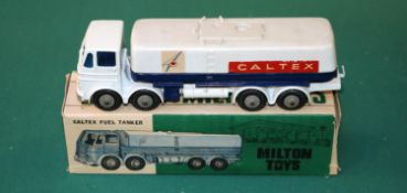 A scarce Milton toys (Calcutta India) Caltex fuel tanker based on the Dinky toys Leyland Octopus.