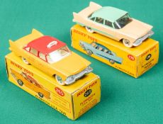 2 Dinky Toys Plymouth Plaza. A U.S.A. TAXI (265) in orange and red with cream interior, TAXI to