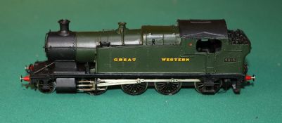 A OO gauge 2-rail electric brass kit built GWR 2-8-0 tank locomotive, RN 4215. A Church Ward