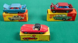 3 Dinky Toys. A Jaguar 'E' Type (120) in bright red with black plastic roof and cream interior, with