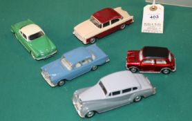 5 Dinky Toys. Humber Hawk in maroon and cream. Volkswagen Karmann Ghia in green and cream. Mini