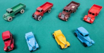 8 Dinky Toys. 4 early open back Motor Trucks (22c), all pre-war examples, green black wheels, red/