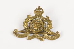 WWI CEF cap badge of the 72nd Overseas Field Battery Canadian Field Artillery, with two brass