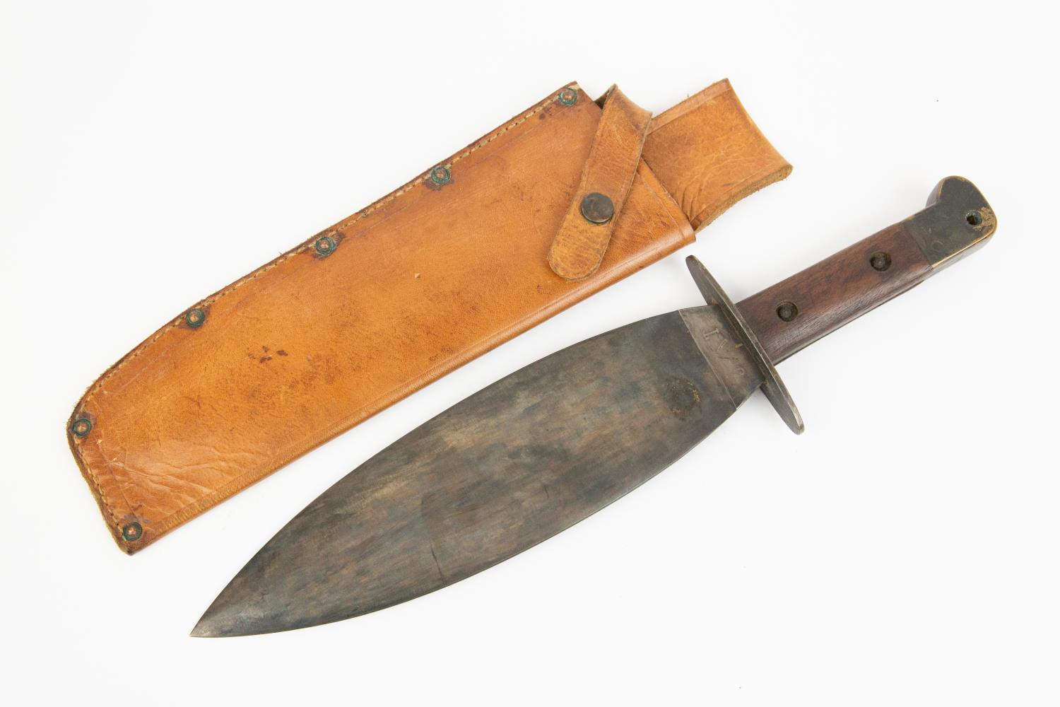 A WWII type smatchet, leaf shaped blade 10½" marked "Made in Sheffield", brass pommel, wood grips,