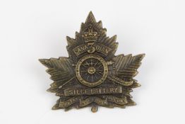 WWI CEF cap badge of the 3rd Overseas Siege Battery Canadian Heavy Artillery, with two lugs. GC £