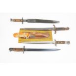 An SMLE India patt. bayonet dated 1944; a Lee Metford 1888 patt type; another SMLE India patt; a