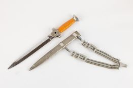 A Third Reich Red Cross Social Welfare Leader's dagger, the hilt with orange grip and nickel