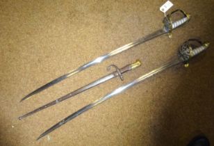 A Victorian 1845 pattern Infantry officer's sword, and another similar with folding guard, quite