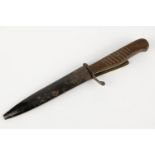 A WWI German trench dagger Nahkampfmesser, the 4¾" blade shortened and ground, with blackened iron