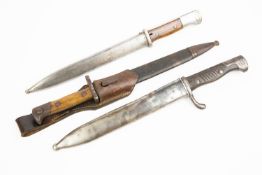 3 German Mauser bayonets: K98, blade marked "44 FNJ", a Model 1871/84 with leather frog, blade