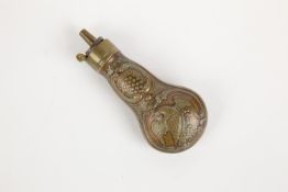 A scarce small size embossed copper powder flask, "American Eagle", (Riling fig 784), 5" overall,