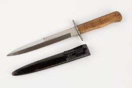 A good WWII German Luftwaffe "boot knife", blade 6½" with Luftwaffe waffenamt mark, plain wood grips