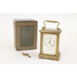 A brass cased carriage clock, by Arthur Baker, Carfax, Horsham, with carrying handle, GC and appears