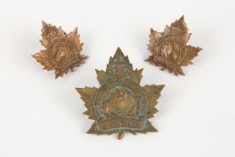 A WWI CEF cap badge of the Remount Depot, and pair of matching collar badges, all by Inglis. GC (