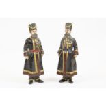 Two speculative Russian painted bronze figures, inscribed "Faberge" and dated 1912, height 7".