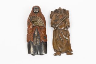 A Japanese Edo period single sided flat backed hollow metal figure of an old bearded man holding a