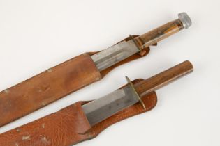 A modern Bowie knife, blade 9½" marked "Original Bowie Knife" in its sheath (AF); another, blade 12"