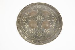 An Indian Benares decorative brass shield, "dhal", 15" diameter, with punched and engraved