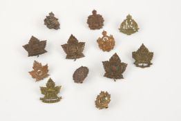 12 single WWI CEF Infantry collar badges: 155th, 158th (prongs), 159th, 160th, 172nd, 175th,