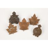 5 WWI CEF Infantry cap badges: 156th, 157th, 158th by O.B. Allan with tangs, 159th by Ellis, and