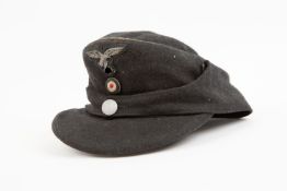A Third Reich Luftwaffe "Herman Goering Division" soft black wool ski cap, with bullion eagle and