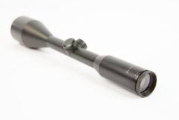 A Schmidt and Bender type 8x56 telescopic rifle sight, with lens covers. Almost as new condition. £