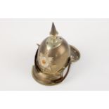 A miniature Imperial German Garde Cuirassier metal helmet, of correct colour metal with white