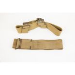 2 webbing waist belts from the 1908 pattern equipment, one dated 1916, the other date illegible.