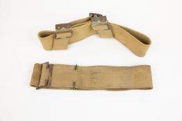 2 webbing waist belts from the 1908 pattern equipment, one dated 1916, the other date illegible.