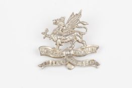 WWI "Kitchener's Army" silver cap badge of the 11th (Lonsdale) Bn. The Border Regiment, HM London