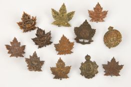 12 single WWI CEF Infantry collar badges: 103rd, 108th, 115th, 118th, 119th, 122nd, 125th (2),