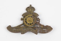 WWI CEF cap badge of the Cobourg Heavy Battery Canadian Heavy Artillery, with one of three prongs,