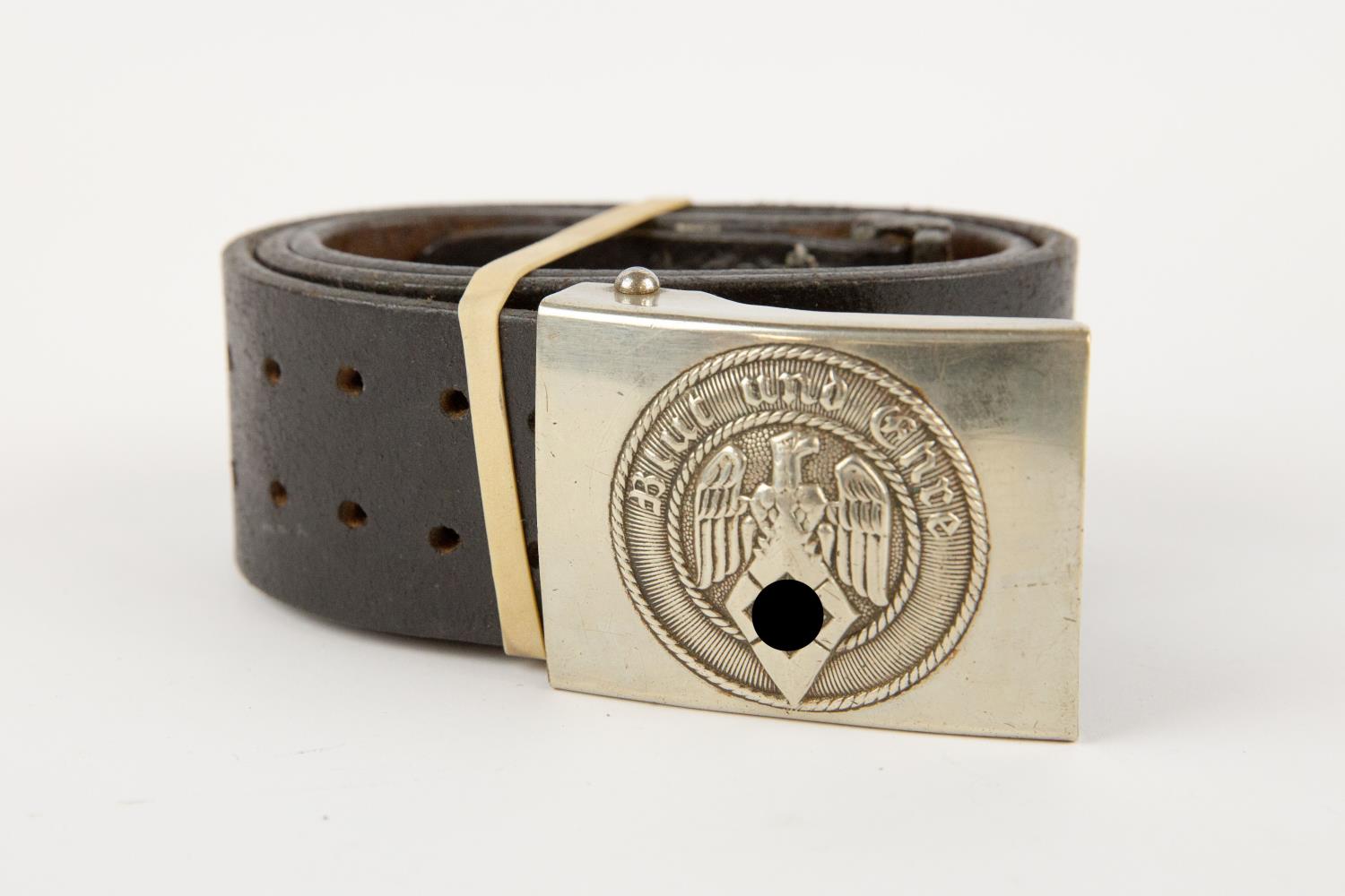 A Third Reich Hitler Youth black leather belt with nickel silver buckle. GC £50-60