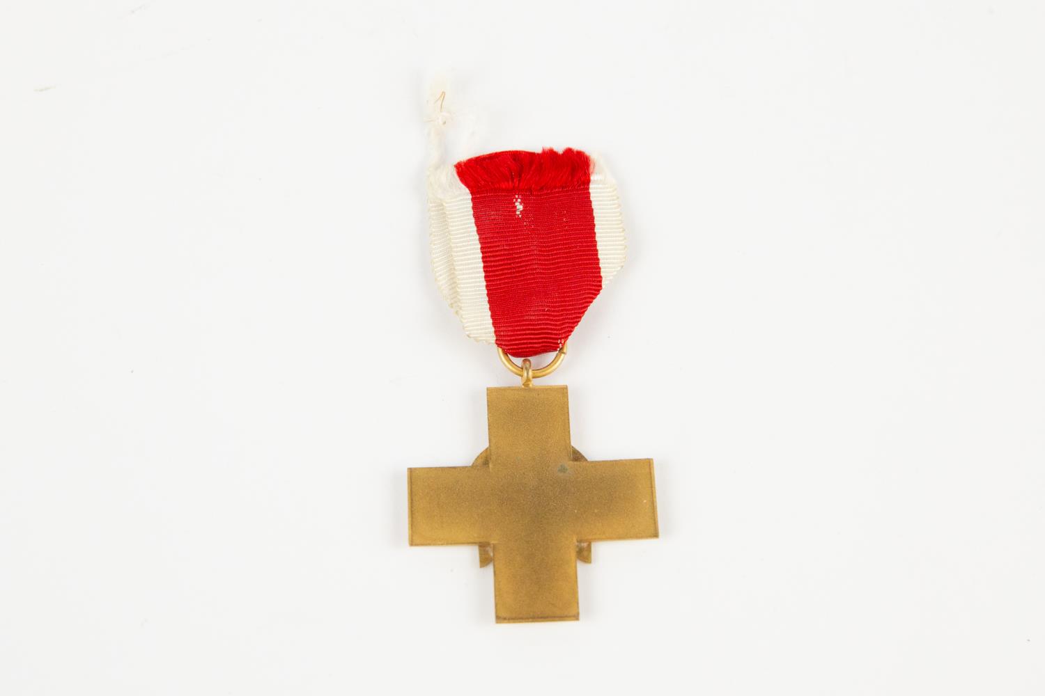 A Third Reich Social Welfare decoration 3rd Class, of gilt and enamel, with ribbon. GC £150-175 - Image 2 of 2