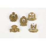 5 WWI New Zealand Reinforcements cap badges, of the 21st, 22nd, 23rd, 25th and 26th