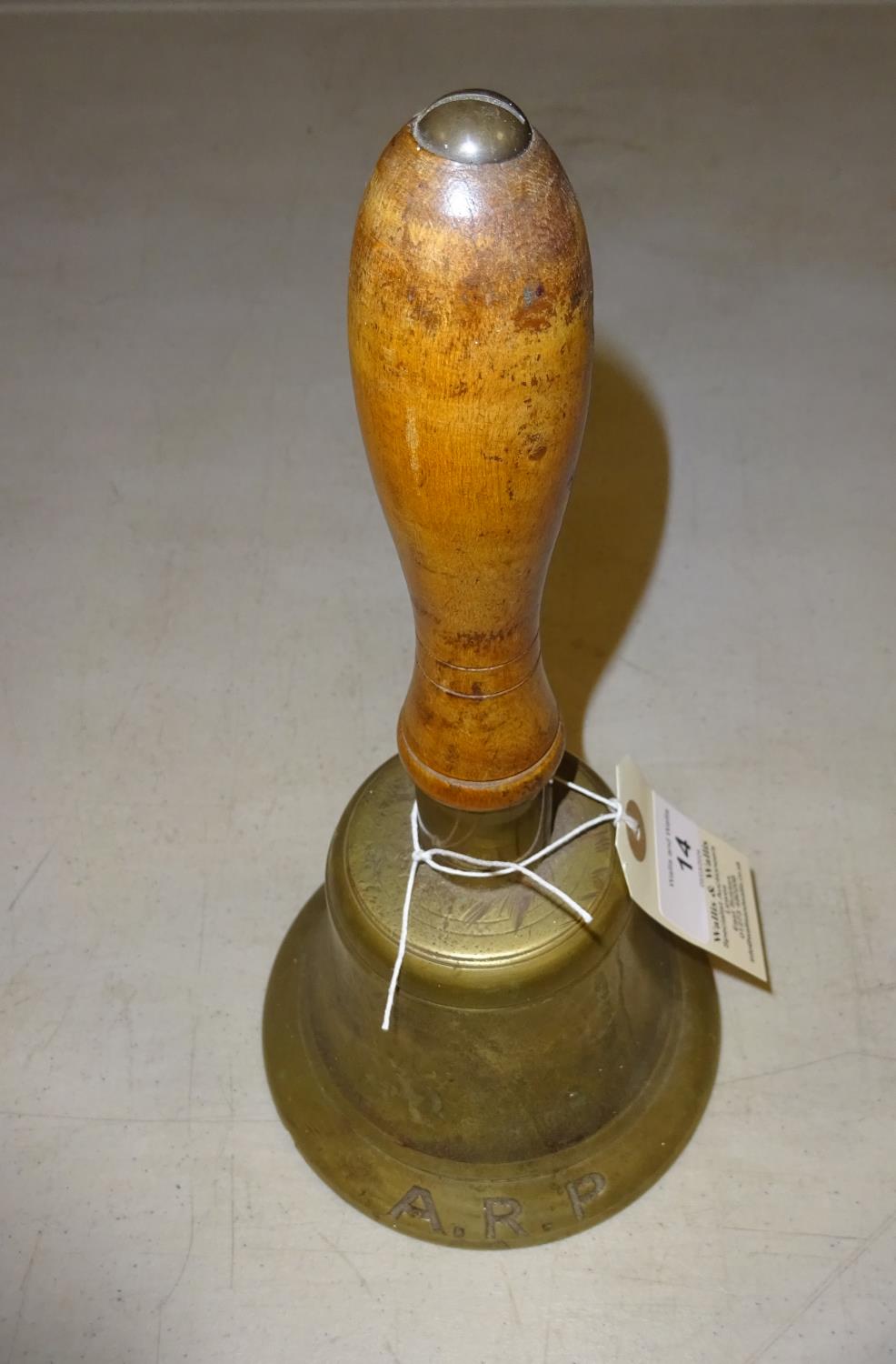 A WWII ARP brass hand bell, turned wood handle, 10¼". GC £40-45