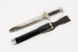 A Third Reich Red Cross Subordinate's hewer, the hilt with plated mounts, in its black painted