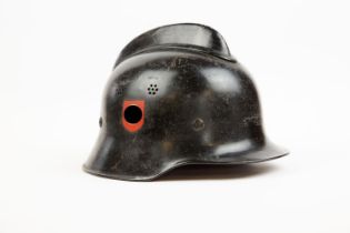 A Third Reich Fire Police steel helmet, black skull with vents and crest and with Police decals,