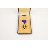 USA Purple Heart award in original case with riband brooch, (impressed Ralph B. Clayton), GVF,