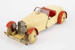 A scarce 1930's No.1 Meccano Constructor Car. An example in cream with red mudguards, red seats,