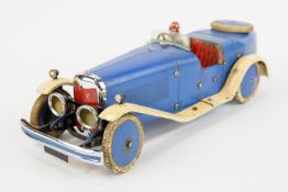 A rare 1930's No.2 Meccano Constructor Car. A boat tail example in blue with cream mudguards/running