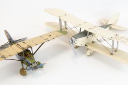 2 Meccano tinplate aeroplanes. Made up as a single engine Bi-Plane in cream and grey, complete
